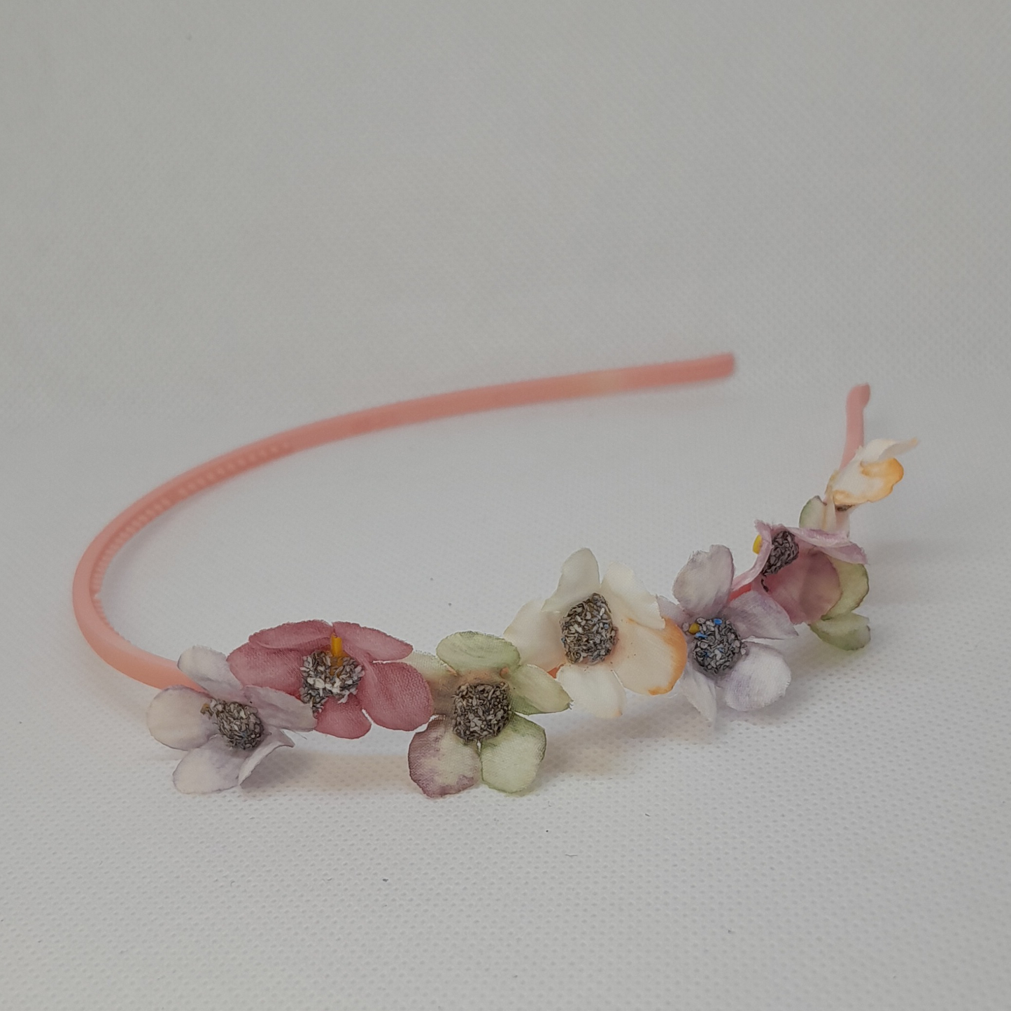 Boutique Pastel Headband for Girls – Partially Adorned with Delicate Artificial Flowers on a Sleek Plastic Band