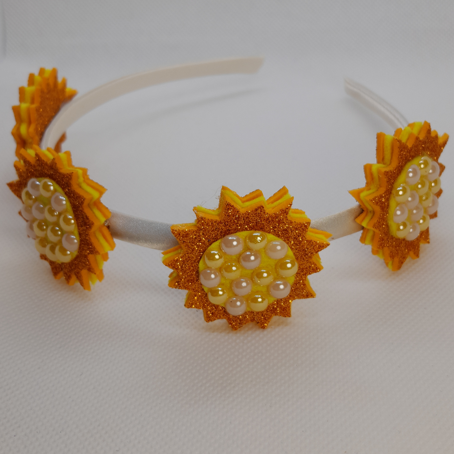 Luxe Satin Headband for Girls with 4 Radiant Suns – Vibrant Orange & Yellow Glow, Adorned with Sparkling Ceramic Stones