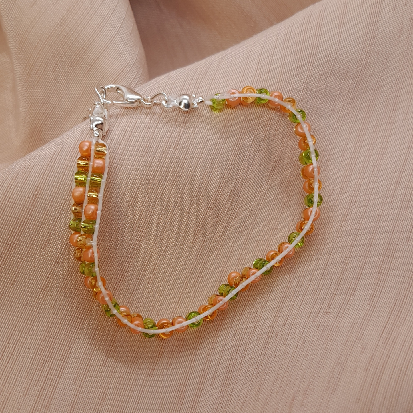 Elegant and Chic Three-Thread Bracelet – Hazel Green, Salmon & Golden Tones
