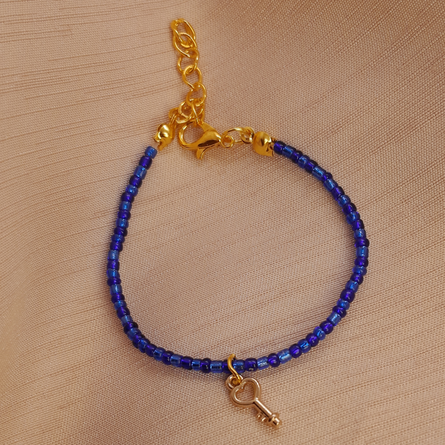 Two-Tone Marine Blue Beaded Bracelet for Ladies – Handmade with Heart Key Charm